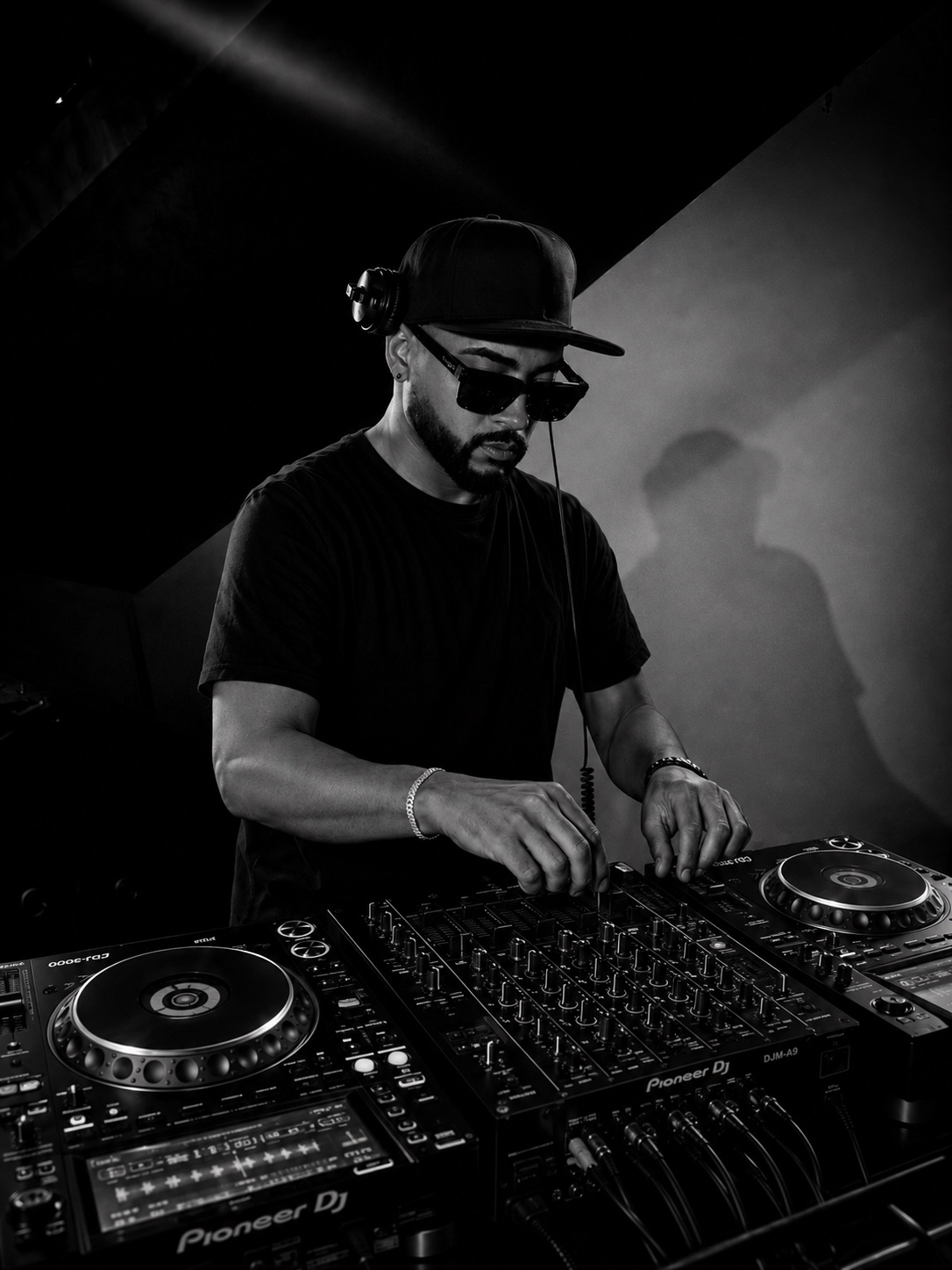 DJ PRADZ performing behind the decks