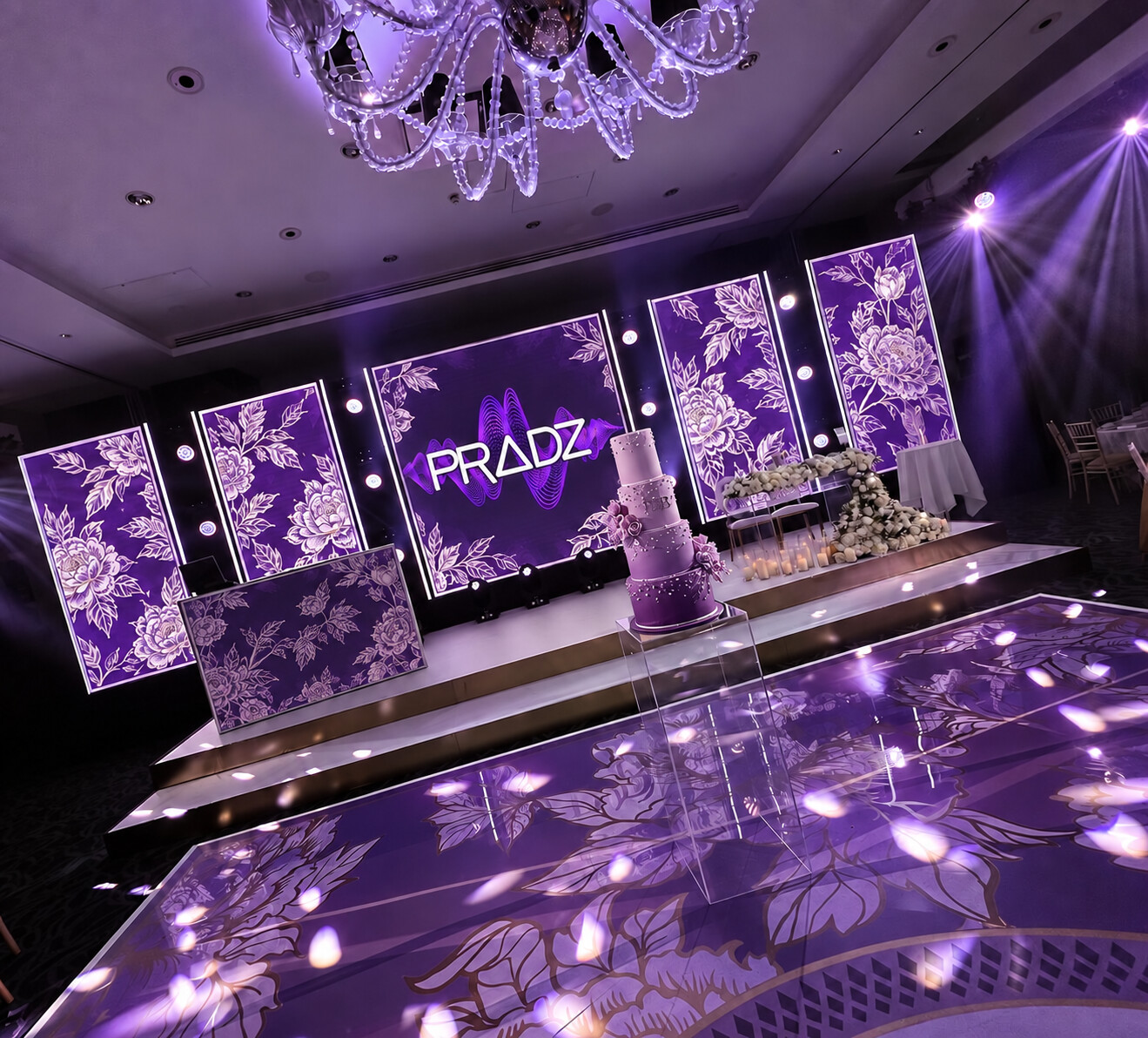 Purple wedding stage and dancefloor with the DJ PRADZ logo